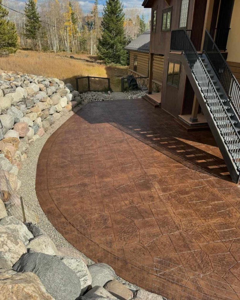 Custom red colored stamped concrete walkway
